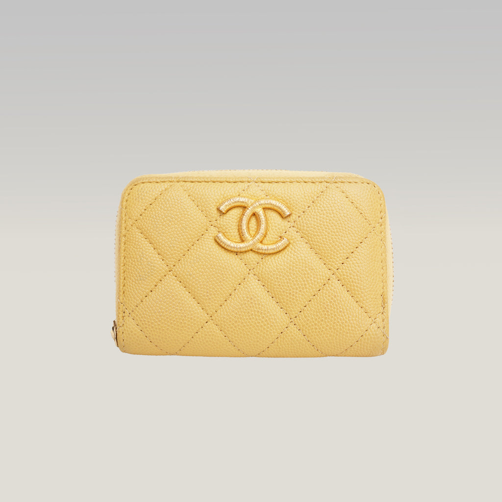 Portafoglio CHANEL in pelle trapuntata gialla con zip