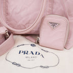 Prada Bauletto Piccolo in Pelle Rosa Cipria con Logo Triangolare e Dettagli Argentati – Dust Bag Inclusa