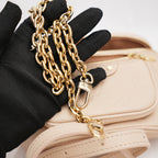 Louis Vuitton Mini Bumbag in pelle Monogram Empreinte sabbia