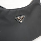 Prada Re-Edition 2005 borsa mini in nylon nero con tracolla – iconica
