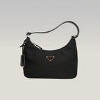 Prada Re-Edition 2005 borsa mini in nylon nero con tracolla – iconica