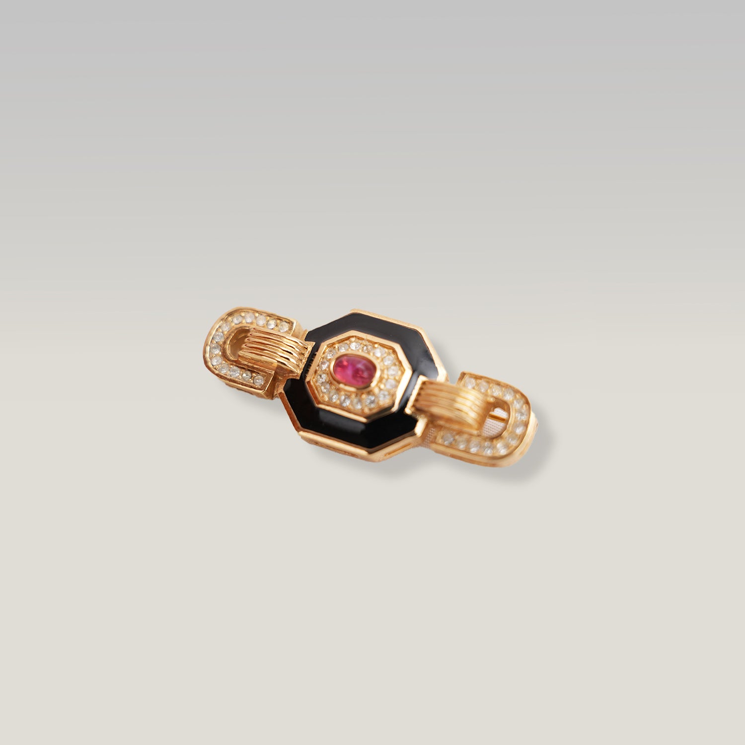Dior Spilla Gioiello Vintage in Lega Metallica Dorata con Strass Smalto Nero e Pietra Rossa