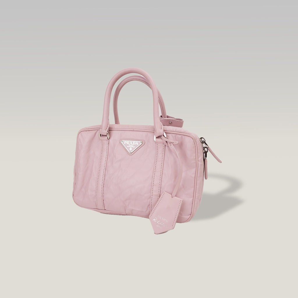 Prada Bauletto Piccolo in Pelle Rosa Cipria con Logo Triangolare e Dettagli Argentati – Dust Bag Inclusa