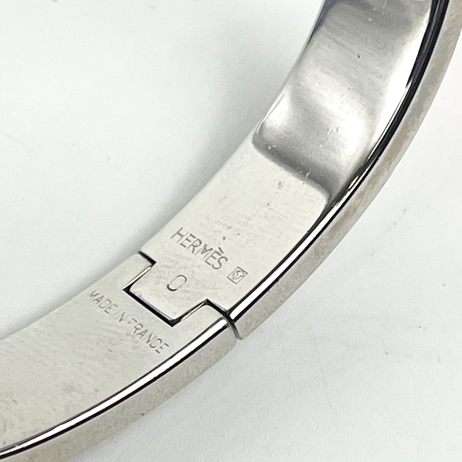 Hermès Bracciale Clic H in Smalto Arancione e Metallo Argentato