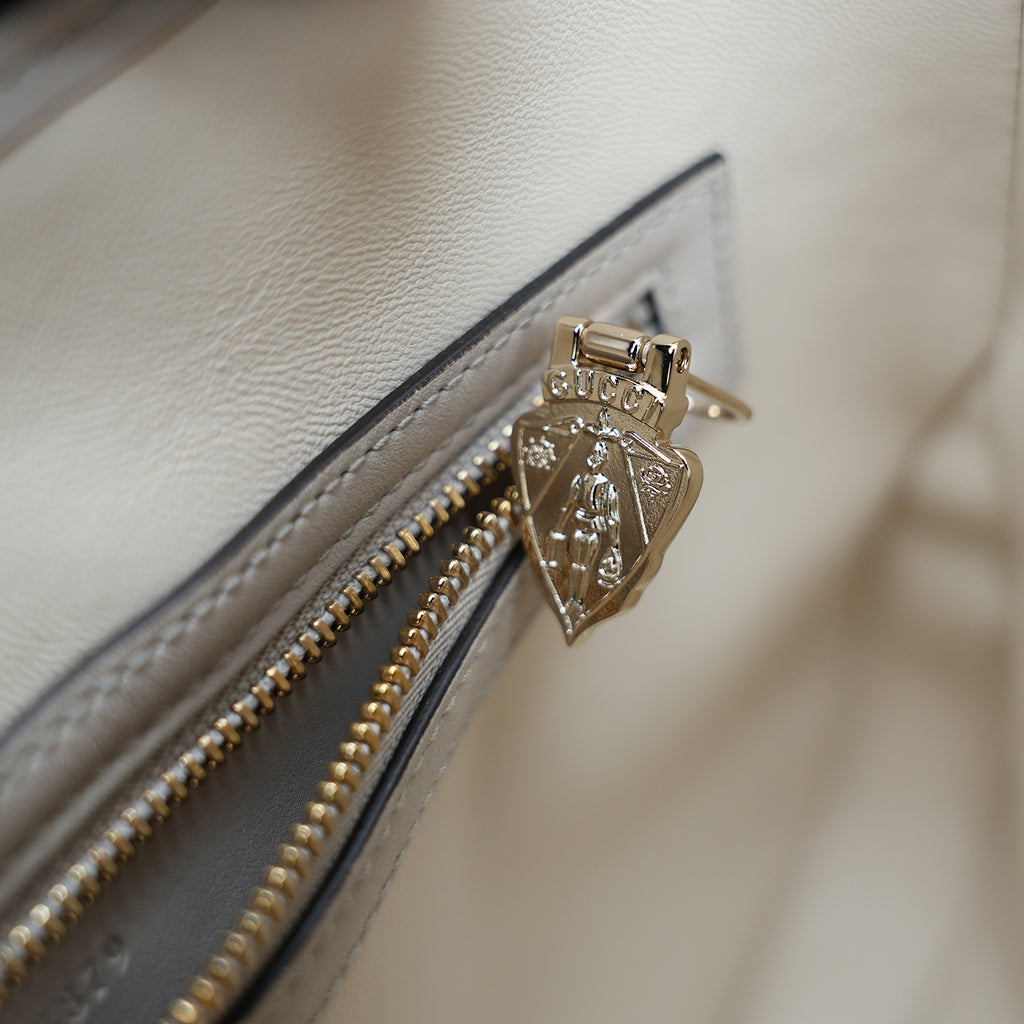Gucci Jackie  borsa a spalla in pelle beige con chiusura piston