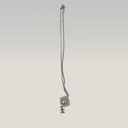 Chanel Collana Vintage con Pendente CC in Metallo Argentato e Strass