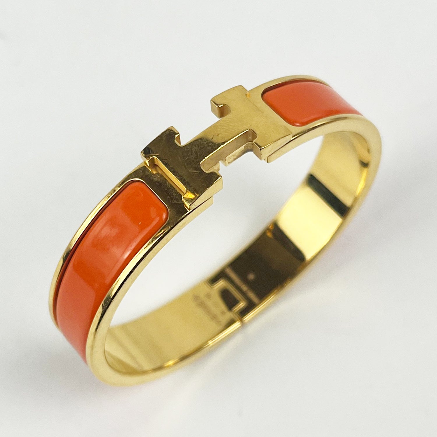 Hermès Bracciale Clic H Arancione e Oro in Smalto con Logo H Iconico