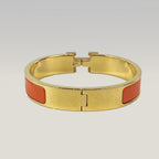 Hermès Bracciale Clic H Arancione e Oro in Smalto con Logo H Iconico