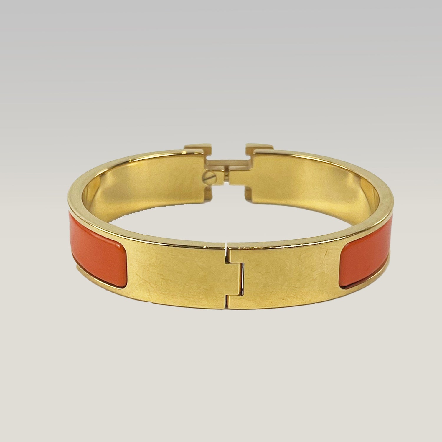 Hermès Bracciale Clic H Arancione e Oro in Smalto con Logo H Iconico