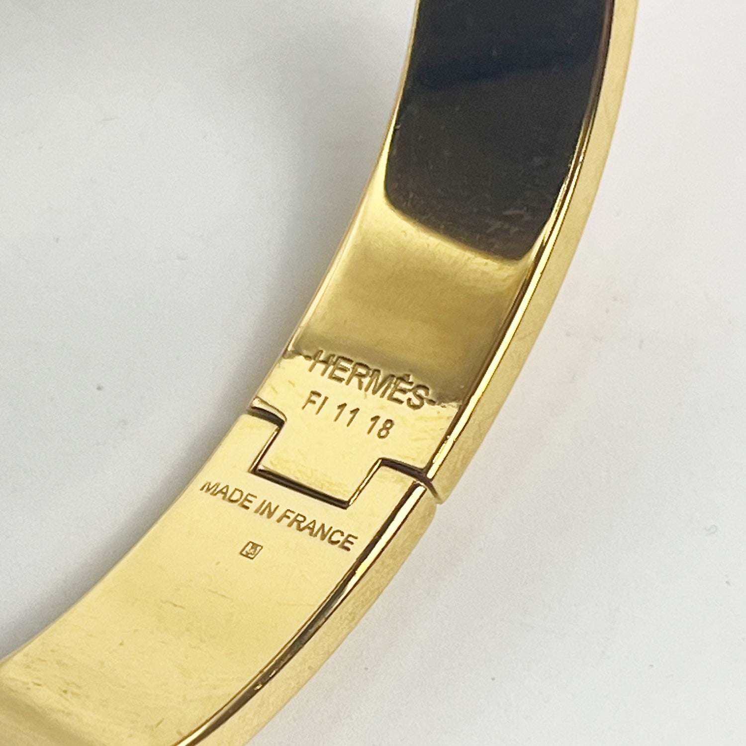Hermès Bracciale Clic H Arancione e Oro in Smalto con Logo H Iconico