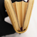 Portafoglio CHANEL in pelle trapuntata gialla con zip