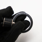 Bottega Veneta Portachiavi Intrecciato in Pelle Nera con Anello Argento