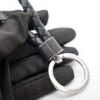 Bottega Veneta Portachiavi Intrecciato in Pelle Nera con Anello Argento
