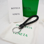 Bottega Veneta Portachiavi Intrecciato in Pelle Nera con Anello Argento