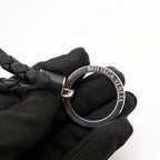 Bottega Veneta Portachiavi Intrecciato in Pelle Nera con Anello Argento