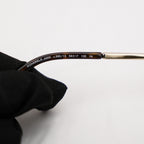 Chanel occhiali da sole con montatura oro e lenti sfumate – eleganti