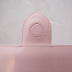 Jacquemus Le Grand Bambino Rosa Pallido in Pelle Verniciata con Manico e Tracolla