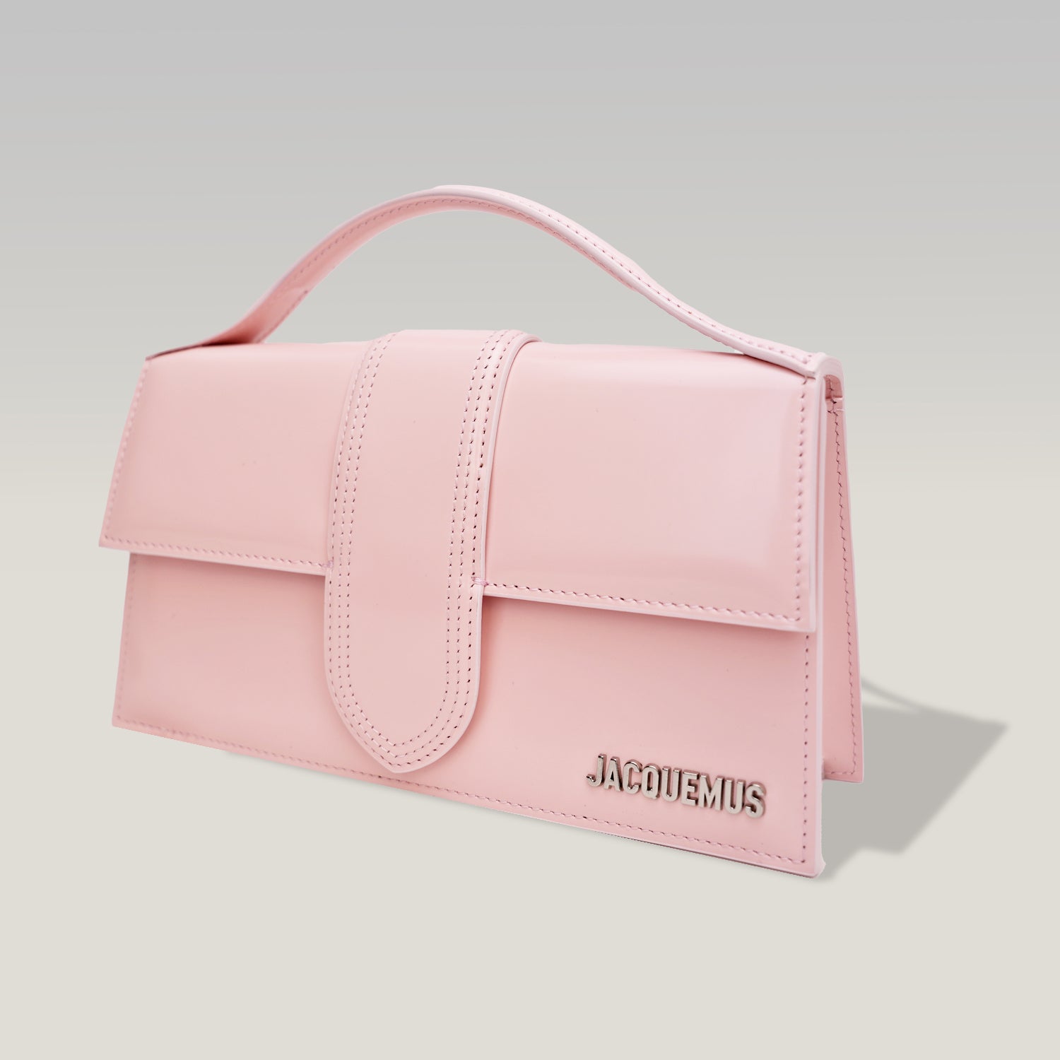 Jacquemus Le Grand Bambino Rosa Pallido in Pelle Verniciata con Manico e Tracolla