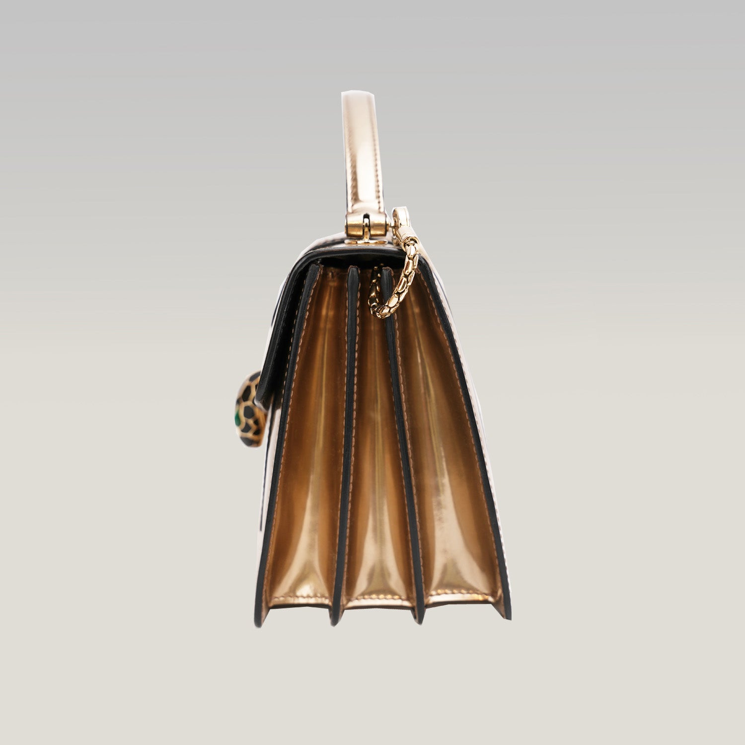 BVLGARI Serpenti Forever – borsa a mano piccola in pelle verniciata oro