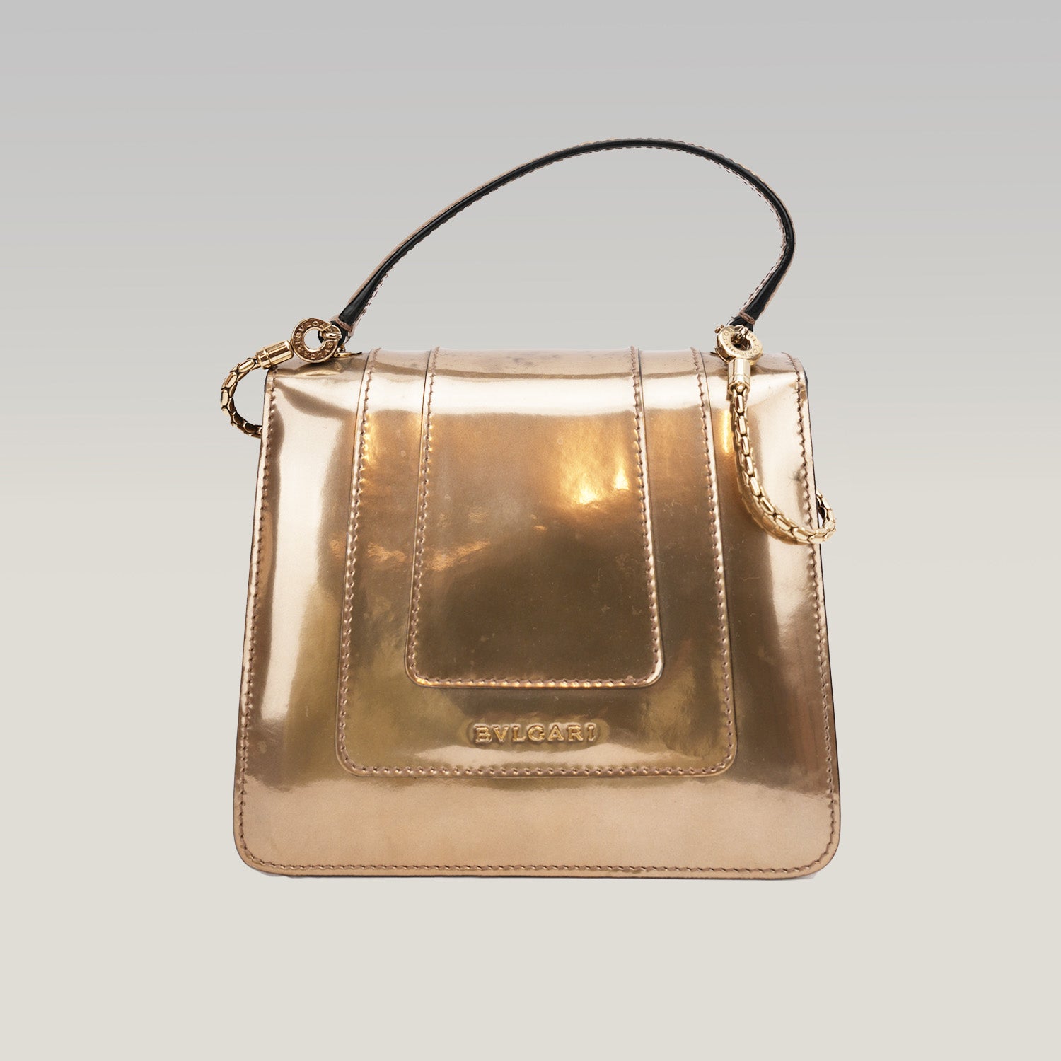 BVLGARI Serpenti Forever – borsa a mano piccola in pelle verniciata oro