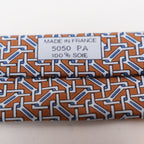 Hermès Elegant Multicolor Geometric Pattern Silk Tie