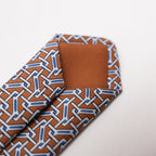 Hermès Elegant Multicolor Geometric Pattern Silk Tie