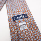 Hermès Elegant Multicolor Geometric Pattern Silk Tie