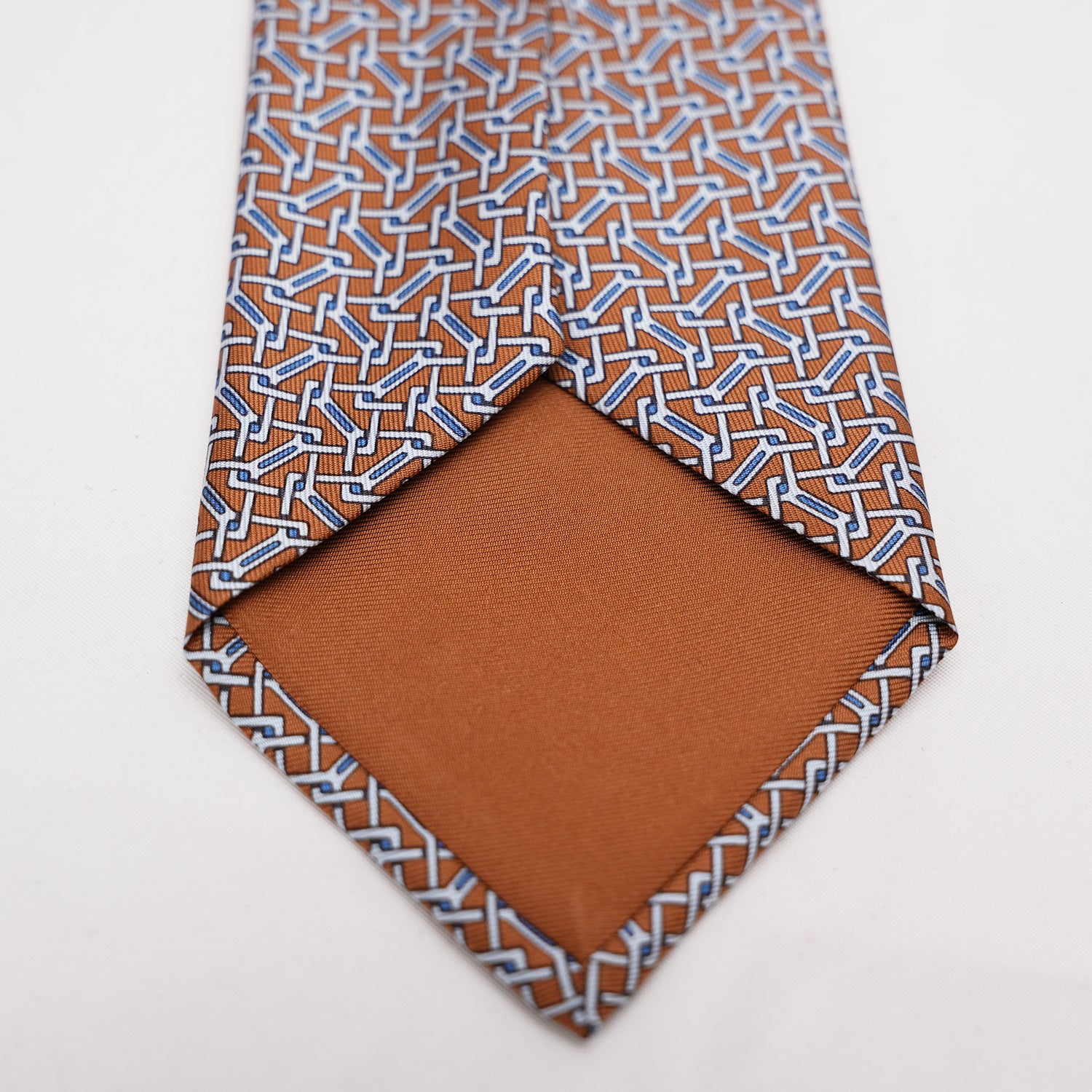 Hermès Elegant Multicolor Geometric Pattern Silk Tie