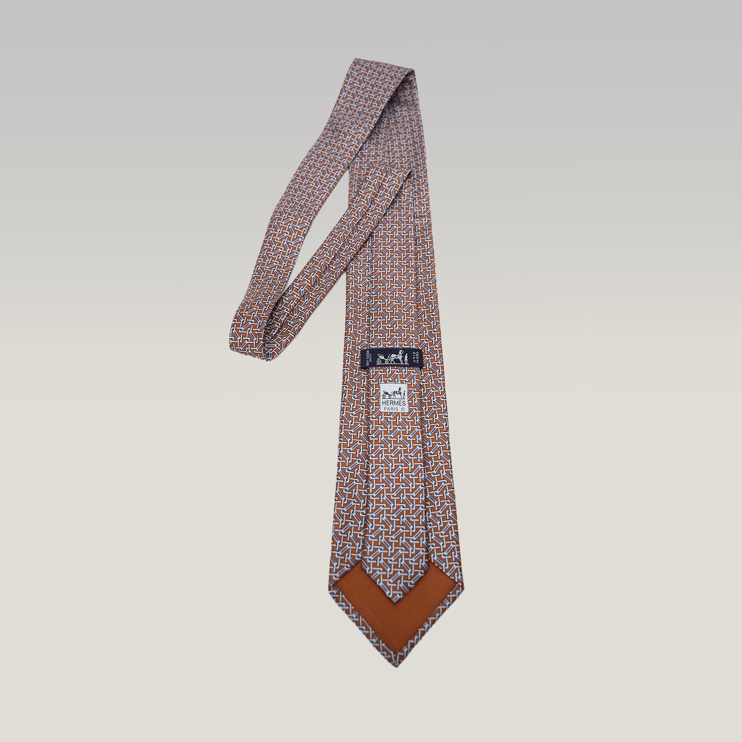 Hermès Elegant Multicolor Geometric Pattern Silk Tie