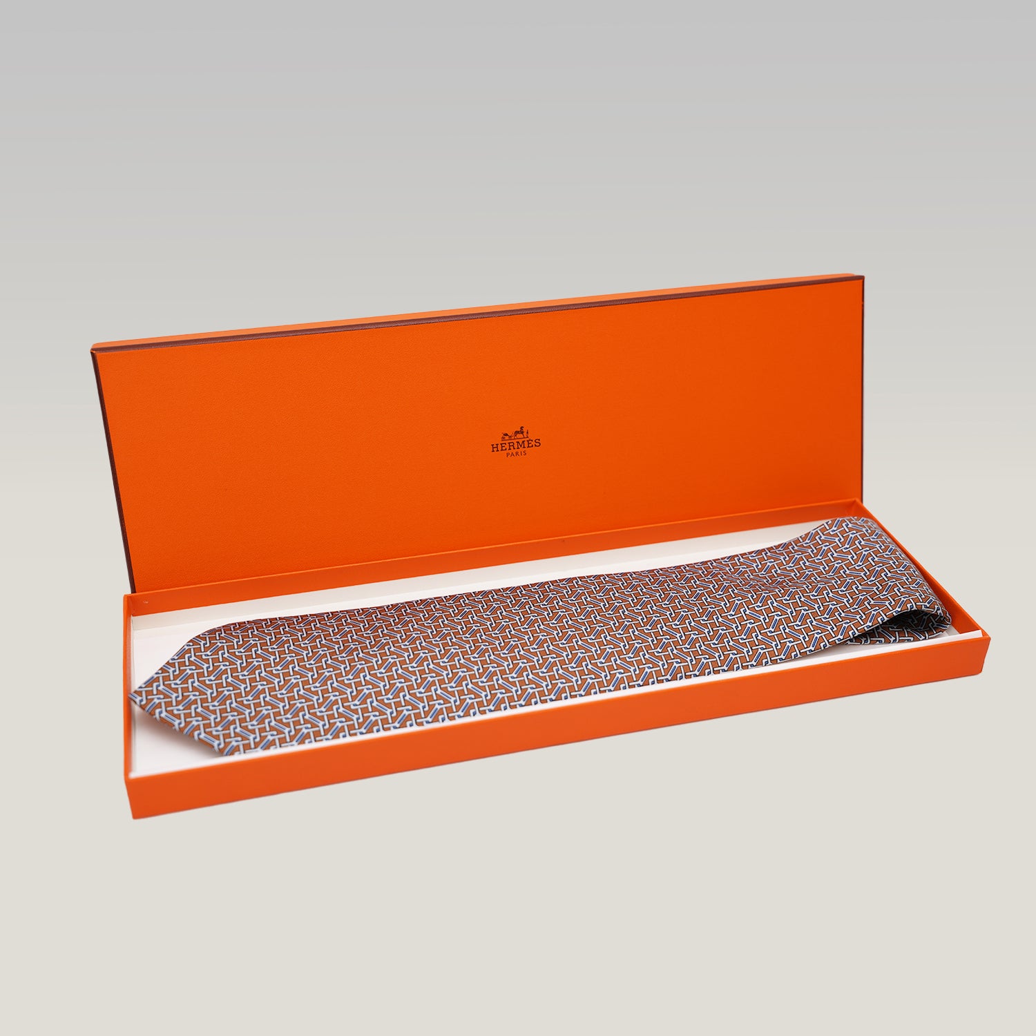 Hermès Elegant Multicolor Geometric Pattern Silk Tie