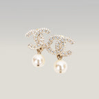 Orecchini Chanel CC con Perla e Strass Oro