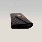 Pochette Saint Laurent Monogram Nera in Pelle Matelassé Chevron con Logo YSL Dorato