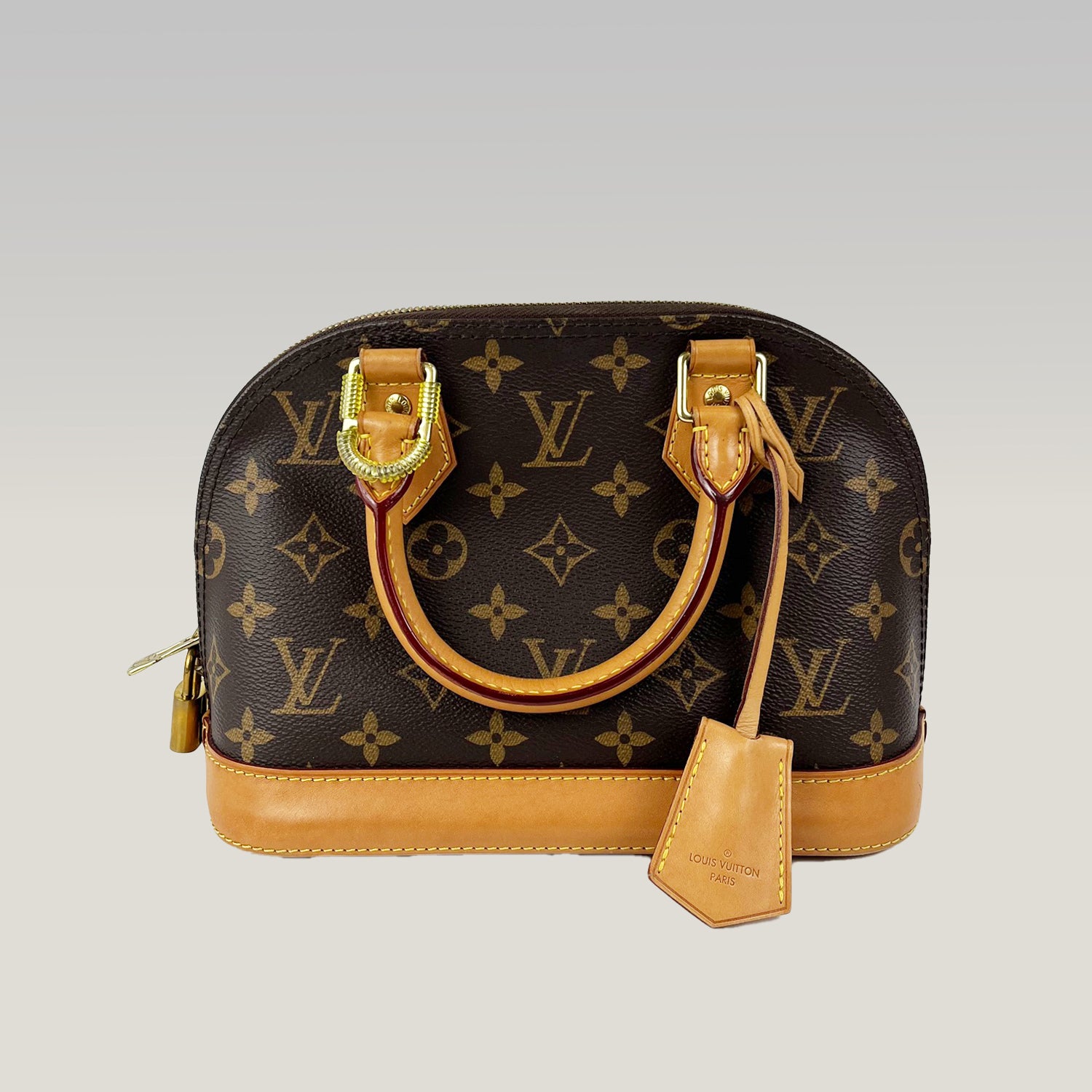 Louis Vuitton Alma BB Monogram Canvas con Charm in Pelle