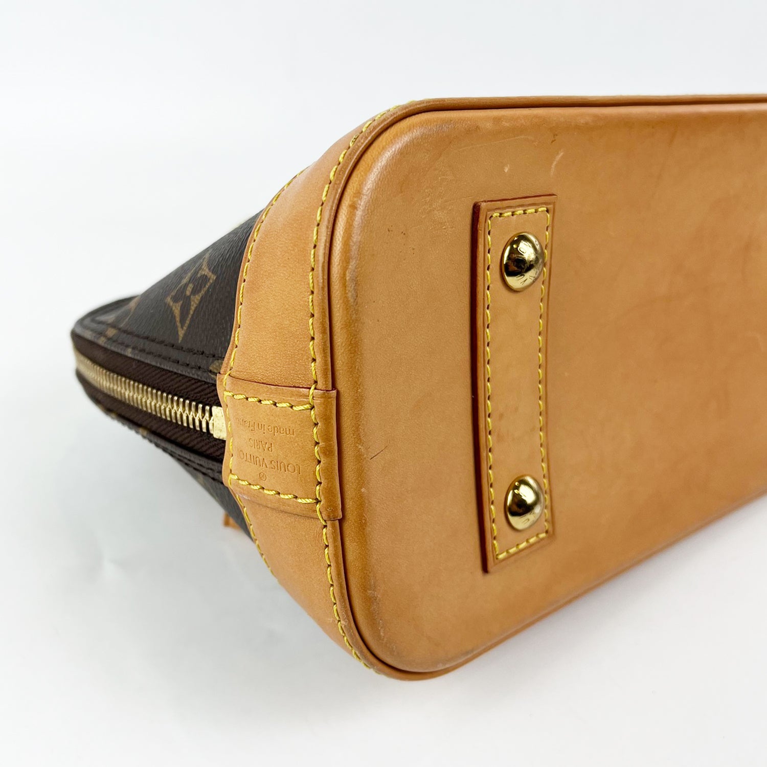 Louis Vuitton Alma BB Monogram Canvas con Charm in Pelle