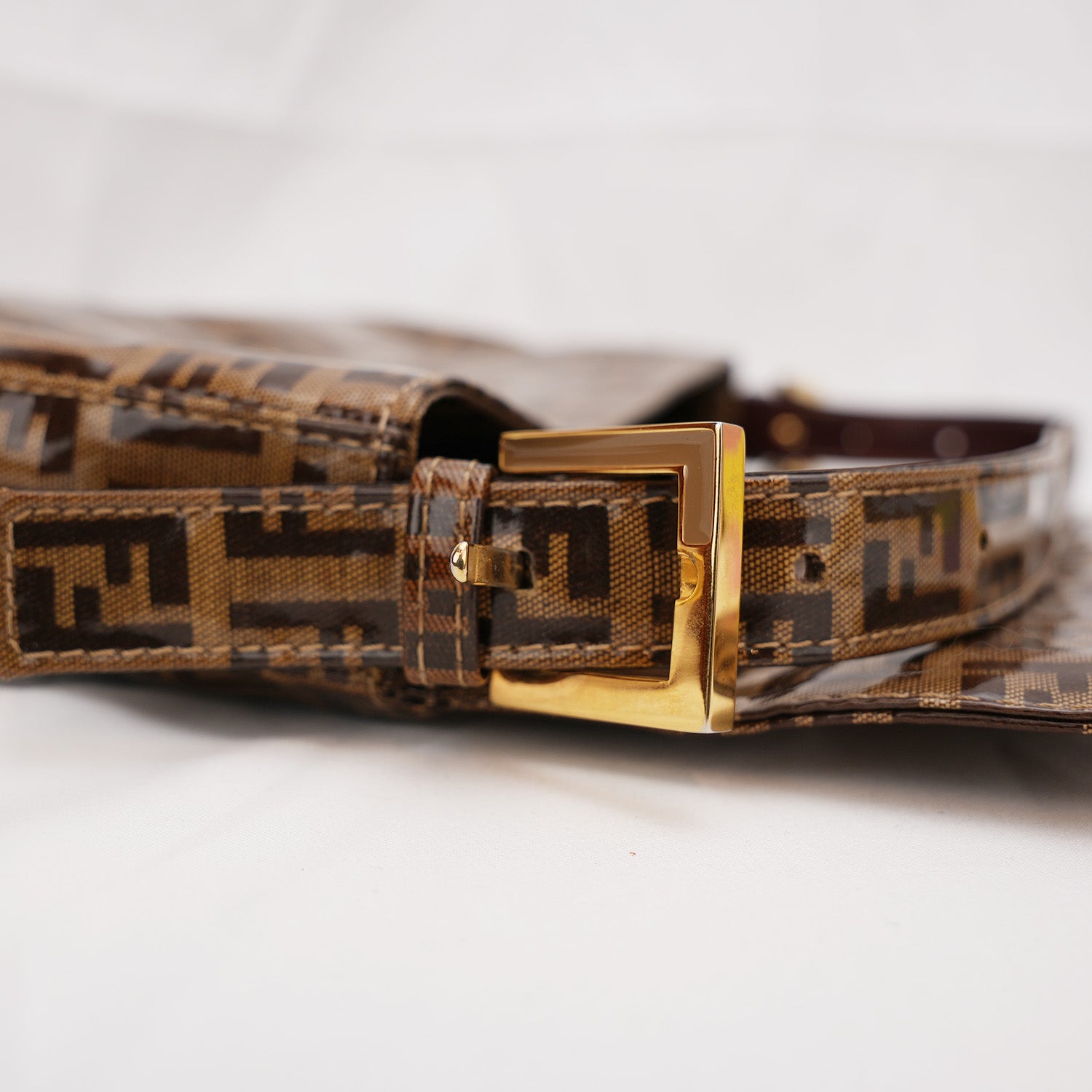 Fendi Baguette – brown FF monogram shoulder bag in crystal-effect leather 