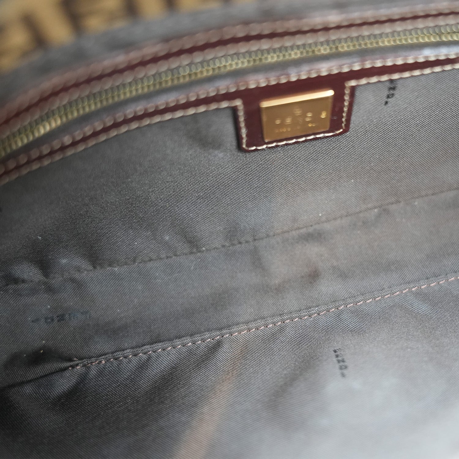 Fendi Baguette – brown FF monogram shoulder bag in crystal-effect leather 