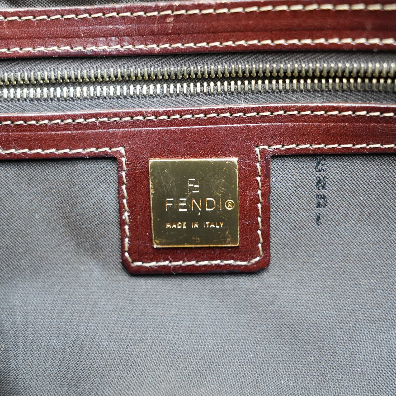 Fendi Baguette – brown FF monogram shoulder bag in crystal-effect leather 