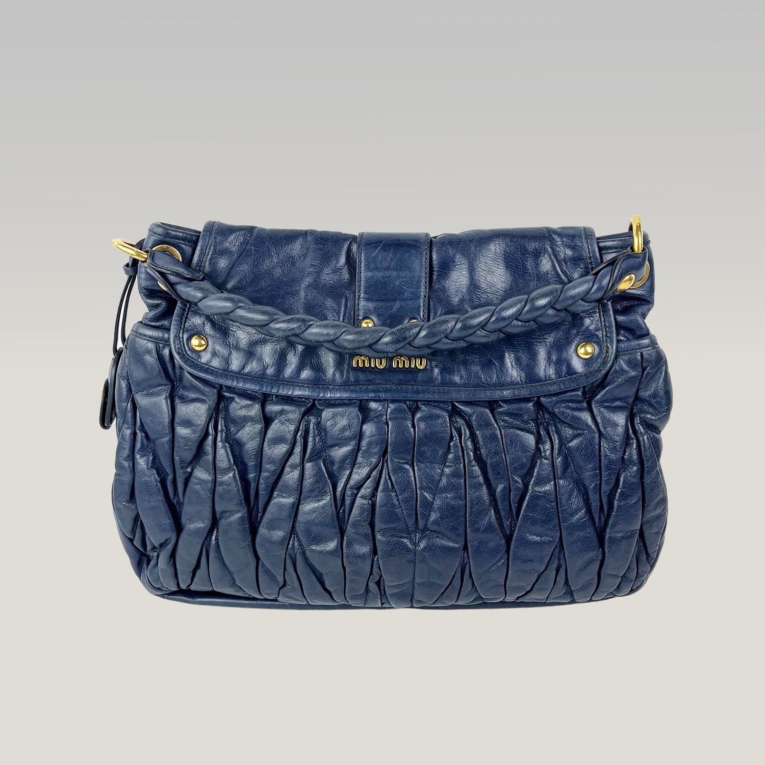 Miu Miu Borsa Coffer in Pelle Blu con Dettagli Oro e Manico Intrecciato