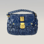 Miu Miu Borsa Coffer in Pelle Blu con Dettagli Oro e Manico Intrecciato