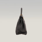 Hermès Kelly 32 Retourne in Pelle Martellata Nera con Hardware Dorato