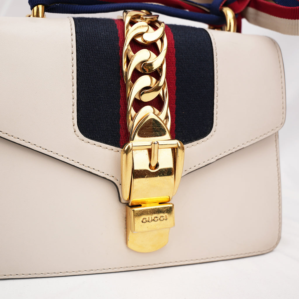 Gucci Sylvie Mini white leather bag with Web ribbon and gold chain