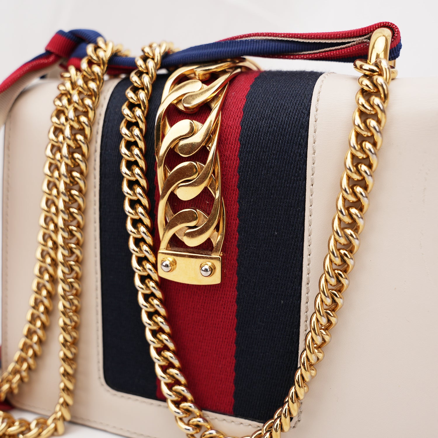 Gucci Sylvie Mini white leather bag with Web ribbon and gold chain