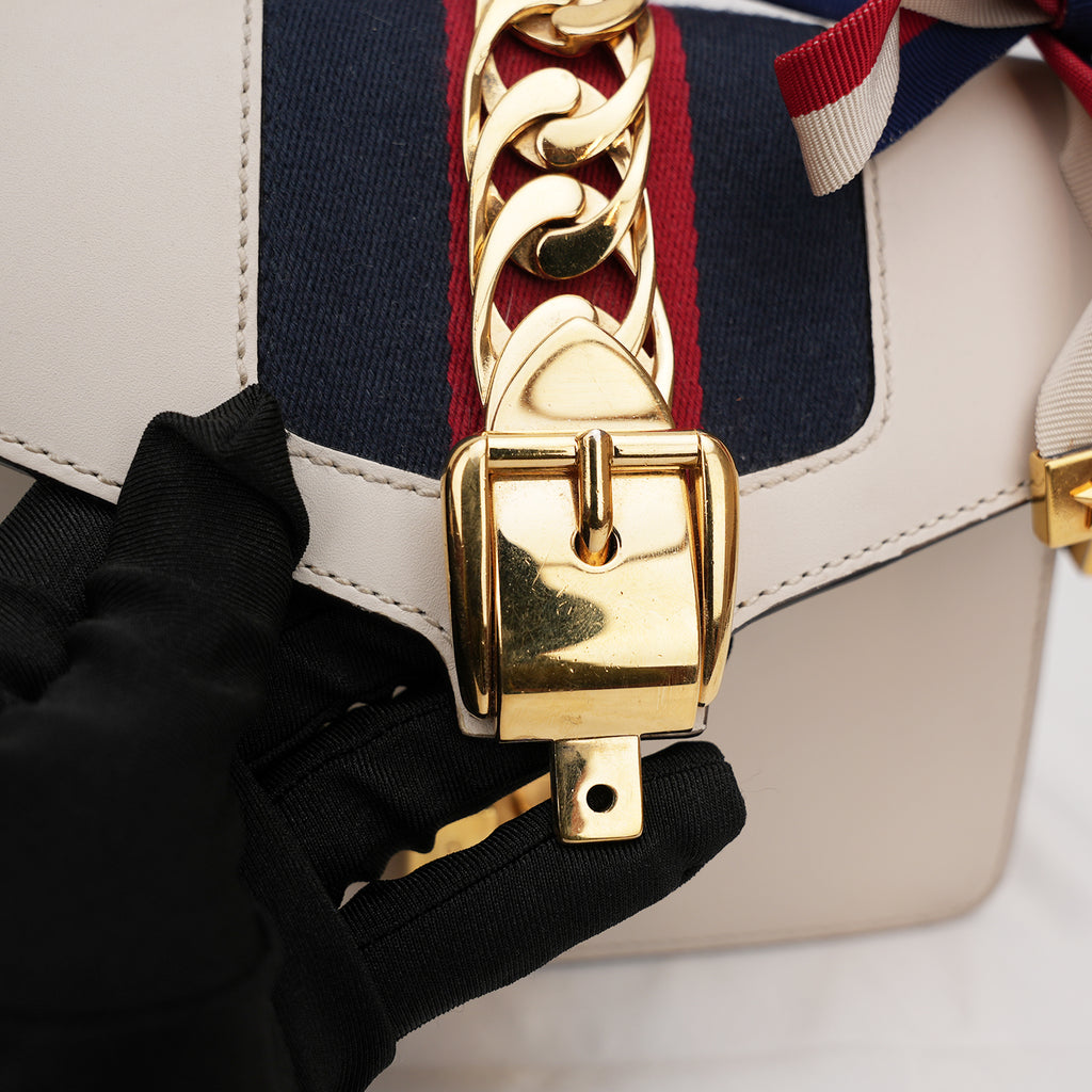 Gucci Sylvie Mini white leather bag with Web ribbon and gold chain