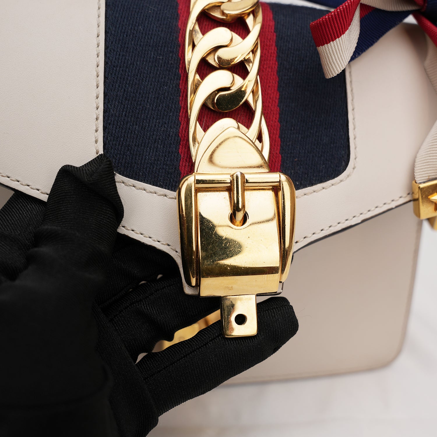 Gucci Sylvie Mini white leather bag with Web ribbon and gold chain