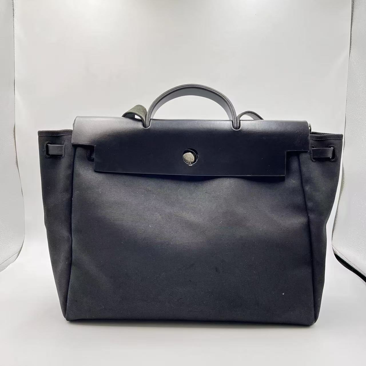 Hermès Herbag 31 nera in tela e pelle bovina