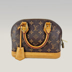 Louis Vuitton Alma BB Monogram Canvas con Finiture in Pelle Naturale