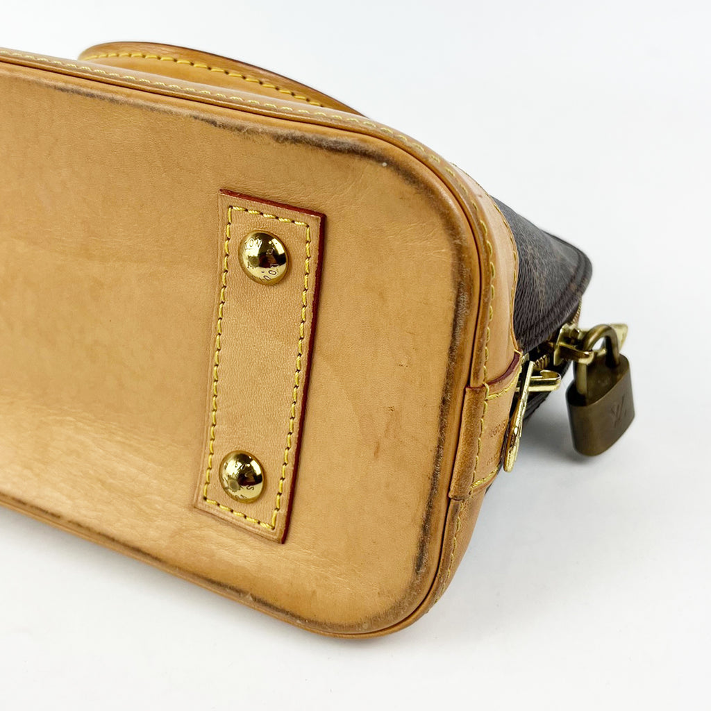 Louis Vuitton Alma BB Monogram Canvas con Finiture in Pelle Naturale