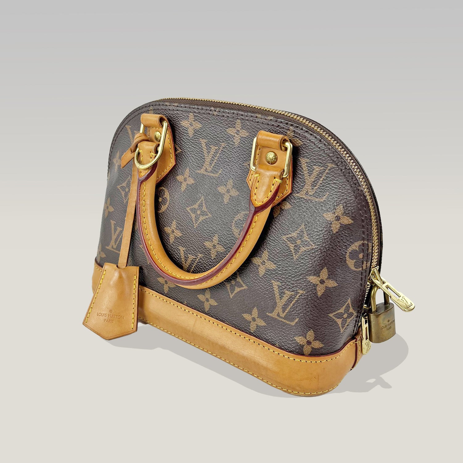 Louis Vuitton Alma BB Monogram Canvas con Finiture in Pelle Naturale