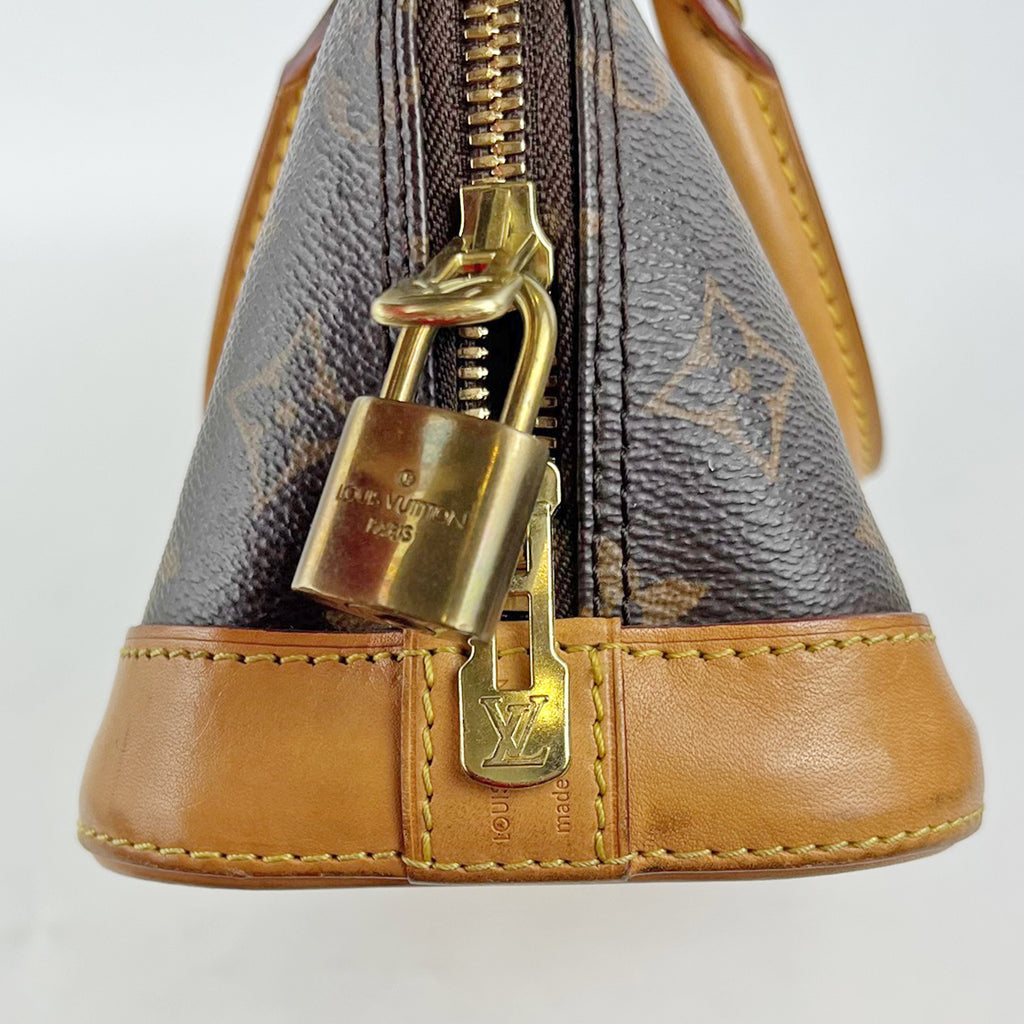 Louis Vuitton Alma BB Monogram Canvas con Finiture in Pelle Naturale