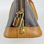 Louis Vuitton Alma BB Monogram Canvas con Finiture in Pelle Naturale